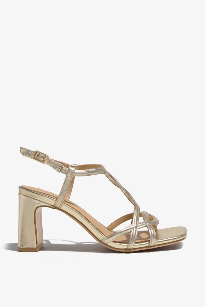 CHELLY-01 wingtip-heel sandal in platino leather with decorative heel