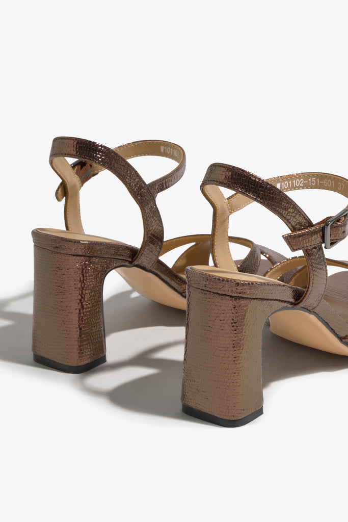 CHELLY-02 wingtip-heel sandal in rust leather with decorative heel
