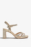 CHELLY-02 wingtip-heel sandal in platino leather with decorative heel