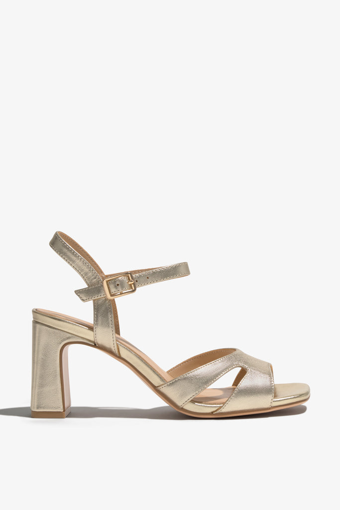 CHELLY-02 wingtip-heel sandal in platino leather with decorative heel