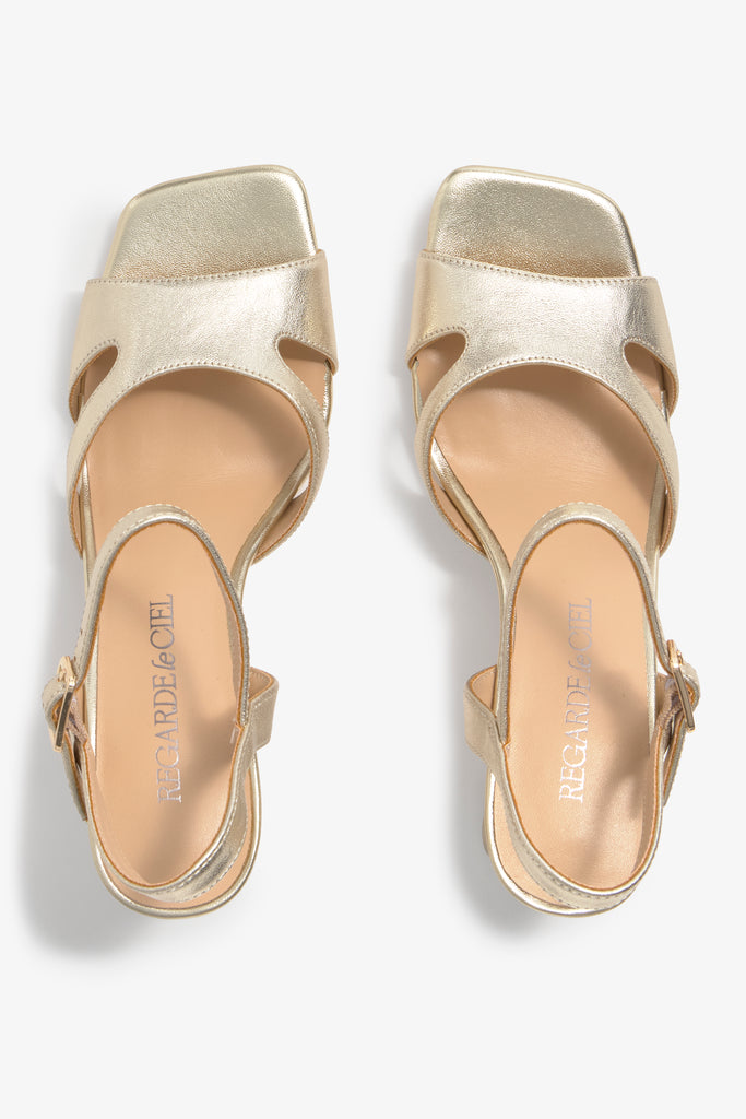 CHELLY-02 wingtip-heel sandal in platino leather with decorative heel