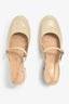 EDDA-01 slip-on in crema leather with wide straps and low heel