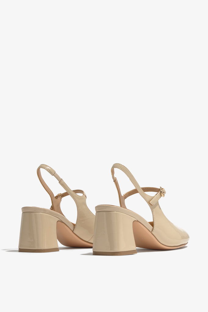 EDDA-01 slip-on in crema leather with wide straps and low heel