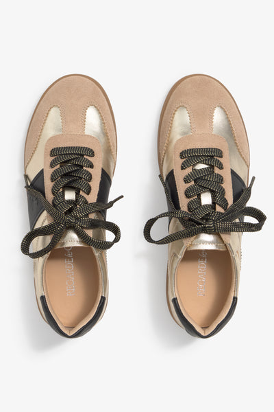 Grisel-01 gold platino leather sneakers by Regarde Le Ciel with black side panel, beige suede toe, black heel tab, and gum sole.