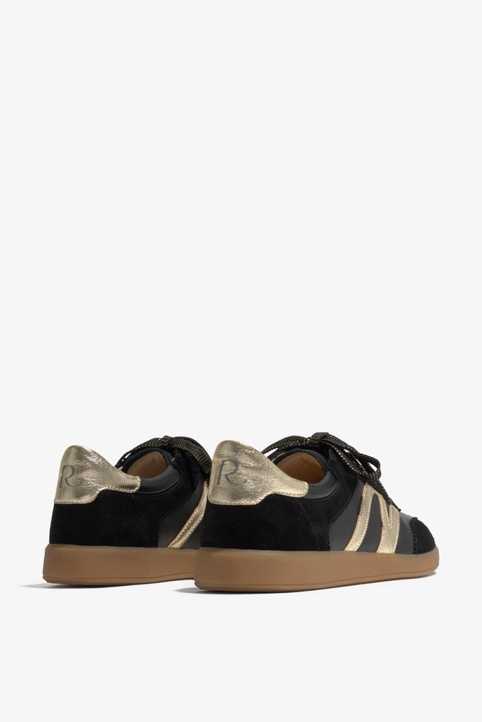 Grisel-02 black leather sneakers by Regarde Le Ciel with gold platino side panel, beige suede toe, gold platino heel tab, and gum sole.