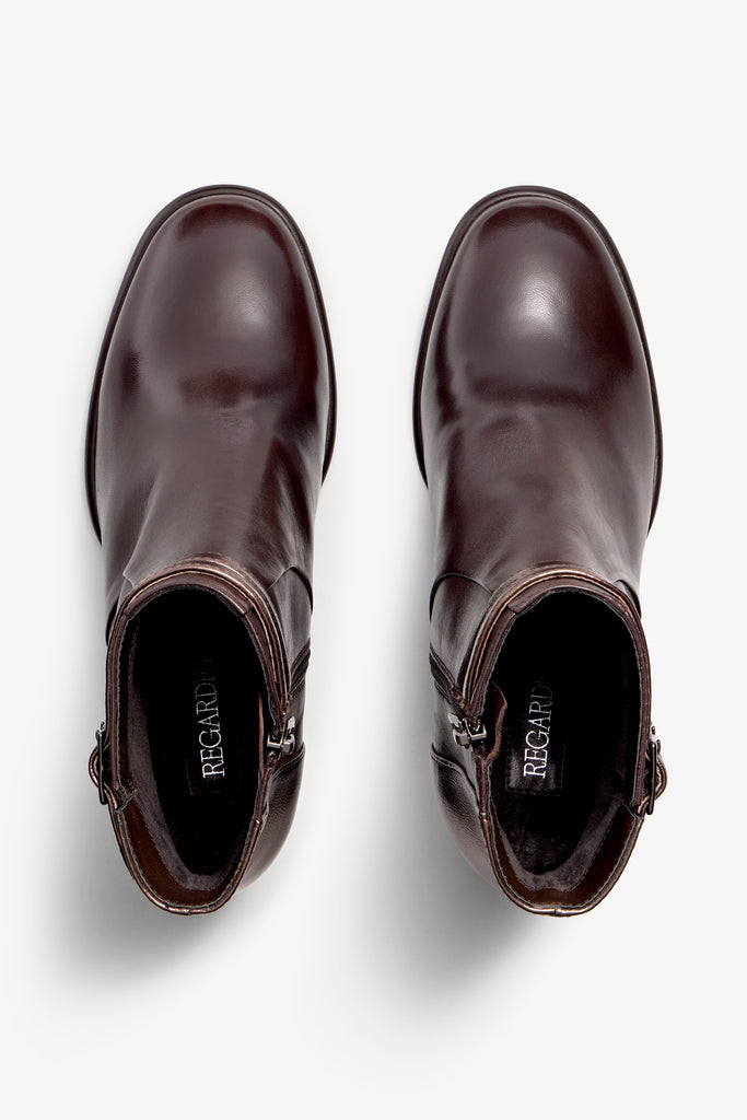 castagno dark brown and metallic brown leather ankle boot, 65 mm heel, zipper, accentuated stitching, rubber sole, plateau and buckle straps.