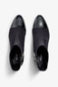 black leather stretch ankle boot features 60mm heel, zipper, accentuated stitching, rubber sole, block heel and memory foam footbed.