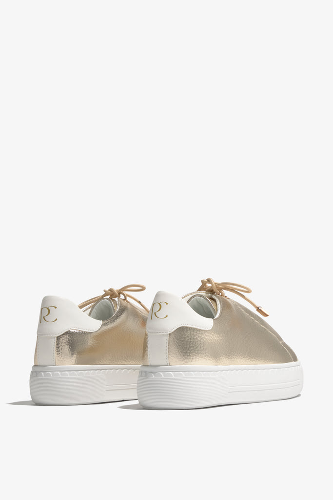 Nathaly-01 Platino leather sneakers by Regarde Le Ciel with gold side accents and gold-detailed laces.