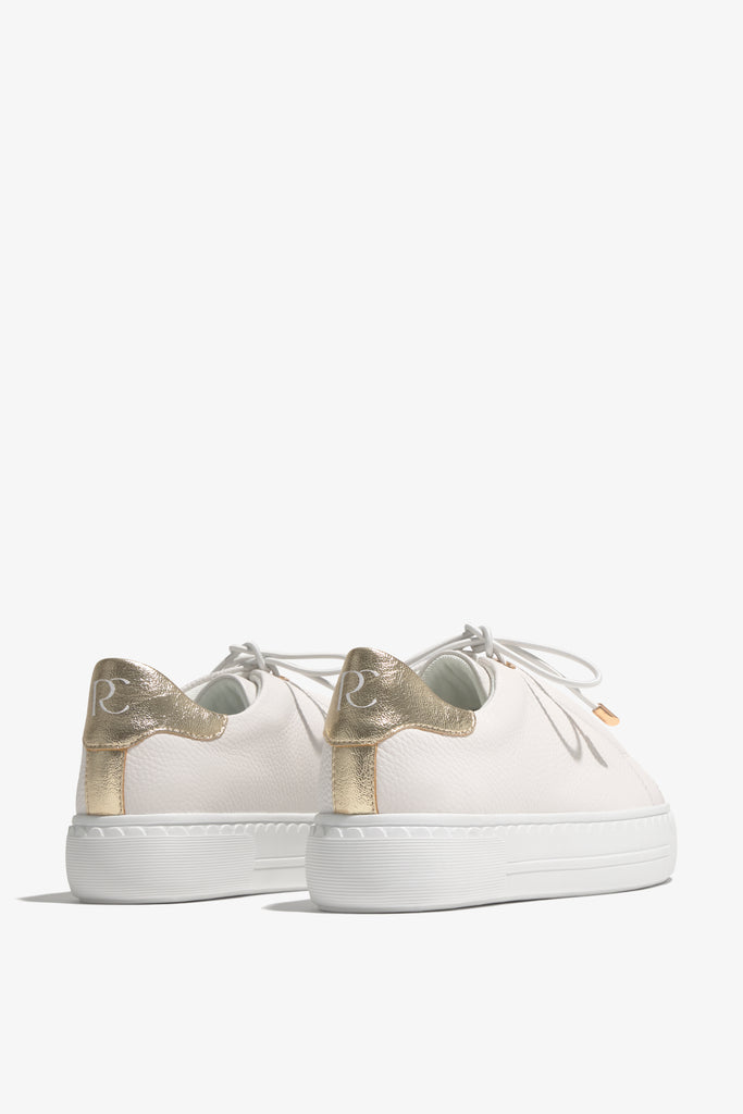 Nathaly-01 White Platino leather sneakers by Regarde Le Ciel with gold side accents and gold-detailed laces.