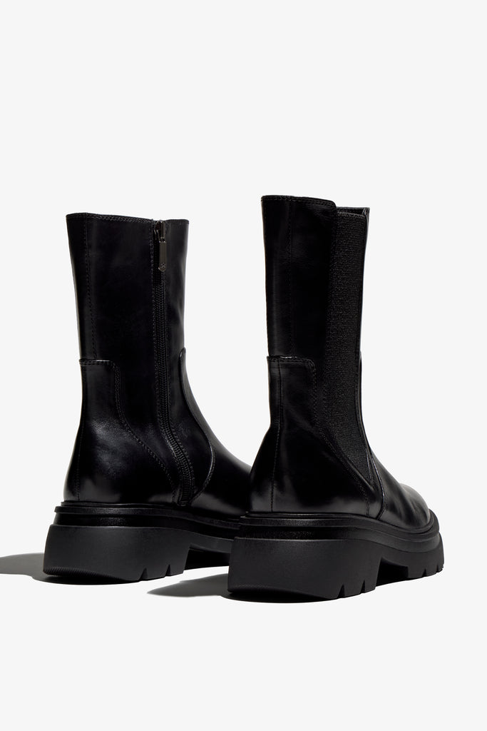 black delice biker boot with 60 mm platform, zipper, textile lining, IP mould sole, and accentuated stitching.