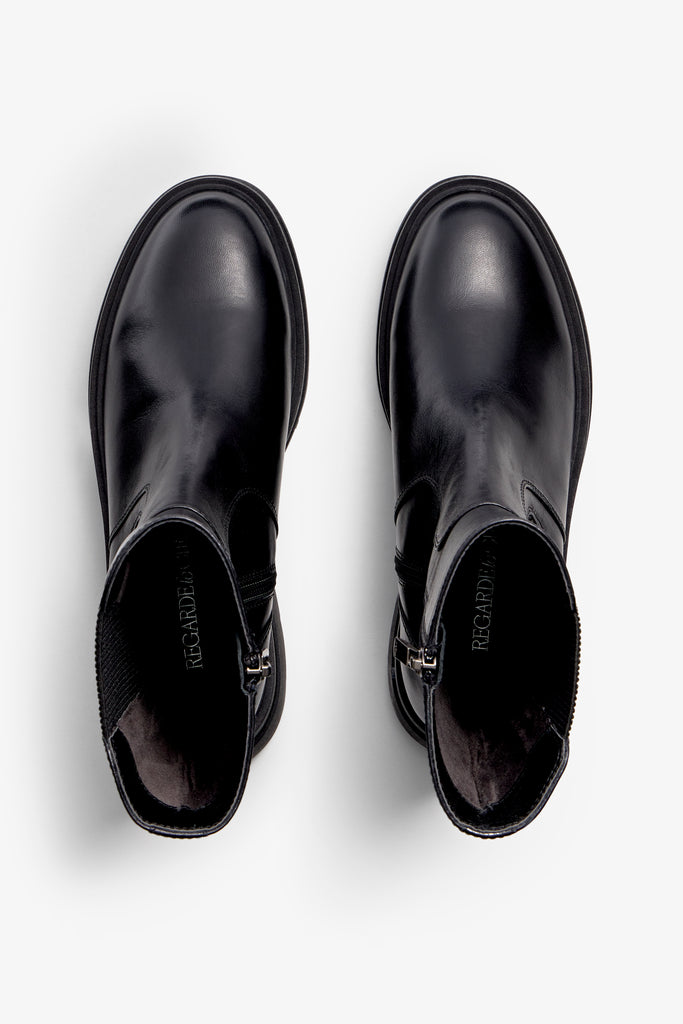 black delice biker boot with 60 mm platform, zipper, textile lining, IP mould sole, and accentuated stitching.