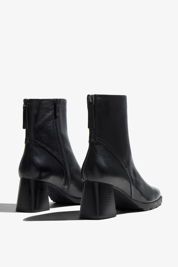 Cali black leather platform ankle boot with platform sole showing opening - top view