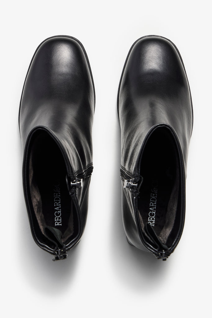 Cali black leather platform ankle boot with lug sole and block heel - back view