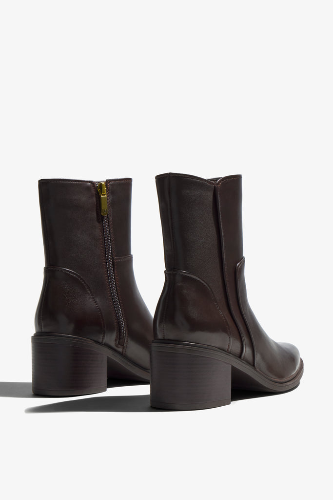 Elettra brown leather knee-high boot showing opening and interior - top view