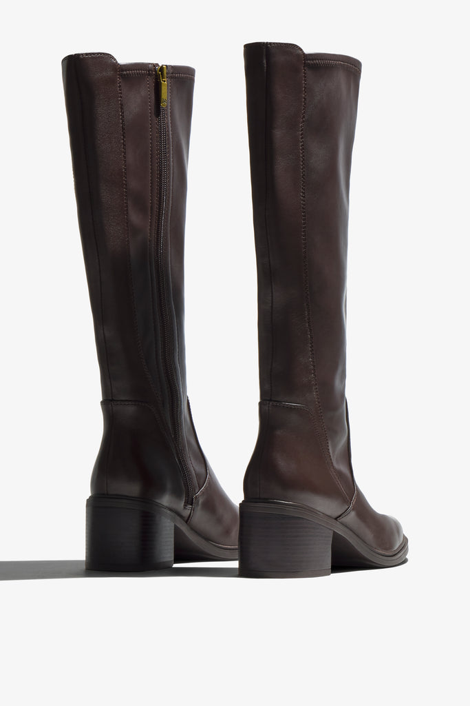 Elettra brown leather ankle boot with curved stitch detail showing opening - top view
