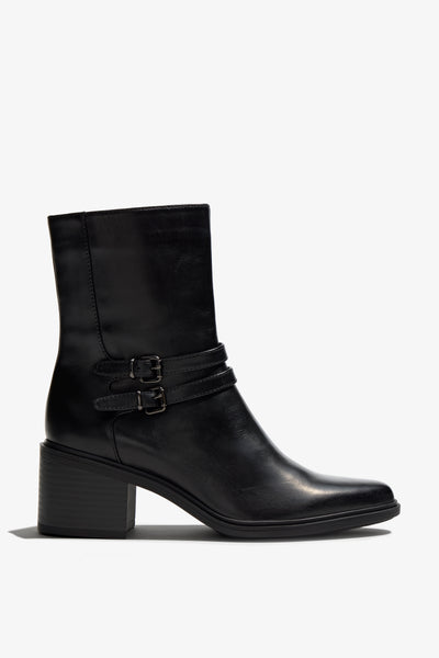 Black leather bootie with 60 mm block heel, two leather buckle straps, accentuated stitching and zipper, rubber sole.