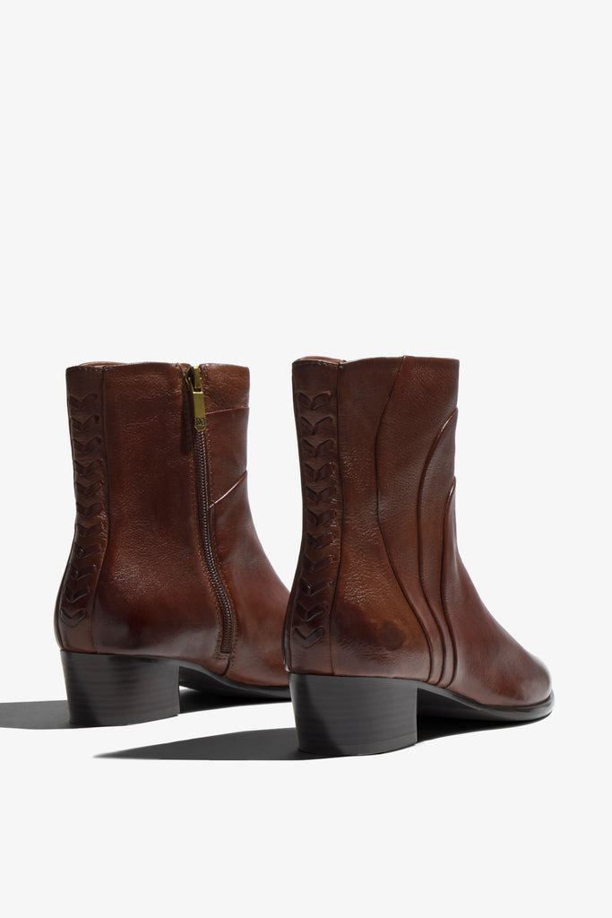 Lori brown leather ankle boot with quilted fold-over cuff showing interior - top view