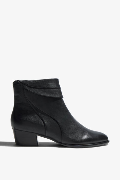 Lori black leather knee-high boot with ruched upper and block heel - side view