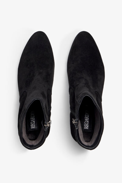 black suede ankle boot features 60mm heel, zipper, accentuated stitching, rubber sole, naplak block heel and memory foam footbed.