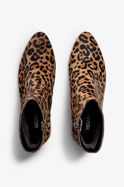 leopard print ankle boot features 60mm heel, zipper, accentuated stitching, rubber sole, block heel and memory foam footbed.