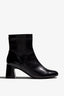 Black ankle boot, 60mm heel, zipper, accentuated stitching, rubber sole, and memory foam footbed.