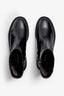 black delice biker boot with 60 mm platform, zipper, textile lining, IP mould sole, and accentuated stitching.