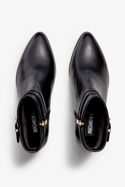 black leather ankle bootie, 60 mm, zipper, buckles and metal accessories, accentuated stitching, block heel, rubber sole.